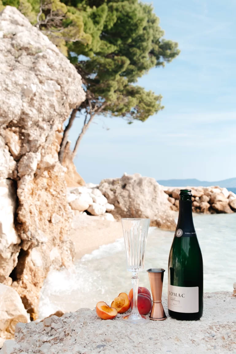 Champagne enjoyed on a hidden cove along the Omiš riviera